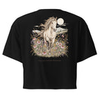 A black short-sleeve crop top shown from the back, featuring a large graphic print of a white horse running through wildflowers under a full moon, with the text 'WILDFLOWER FRANGE' below.